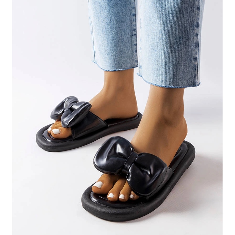 Lenden mustat tossut rusetilla 1