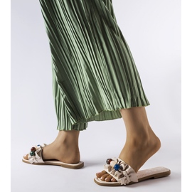 Fortierin beige-röyhelöiset liukumäet musta 1