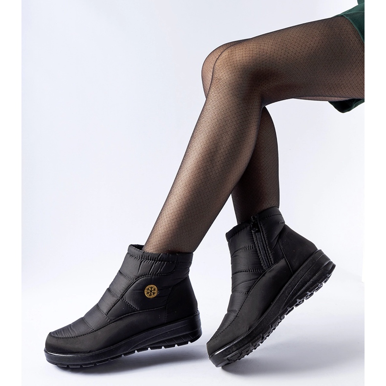 Mustat lumisaappaat, joissa matala kiila Vittore 1