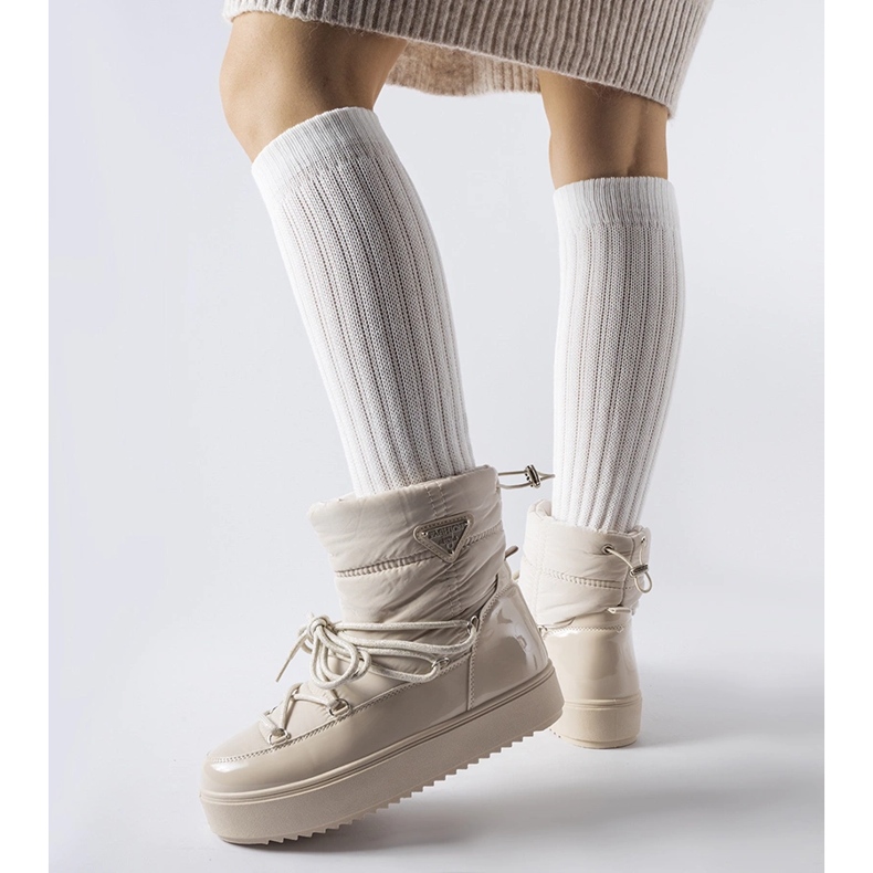 Beiget eristetyt lumisaappaat joustavalla Oslavialla 1