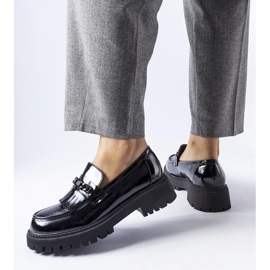 Agordinan mustat kiiltohousut soljella 1