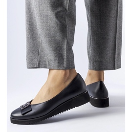 Mustat balettihousut, joissa on jousi kiilassa 1