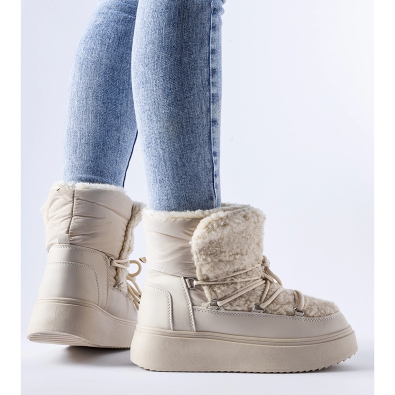 Beiget lumisaappaat massiivisella Elvio-tasolla 1