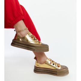 Kultaiset tennarit GOE NN2N4055 alustalla kultainen 2