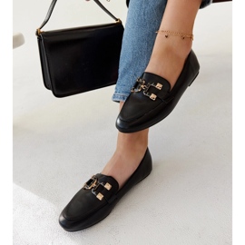 Mustat loaferit, joissa Comerio-solki 1