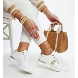 Valkoiset ja kultaiset tennarit Nihad-kumialustalla valkoinen 1