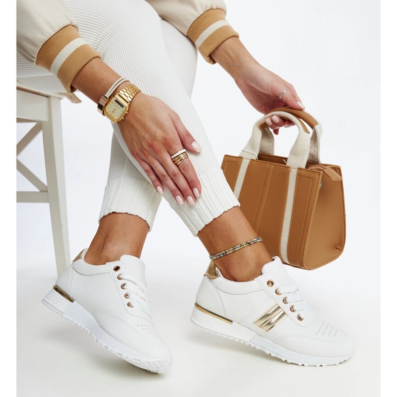 Valkoiset ja kultaiset tennarit Nihad-kumialustalla valkoinen 1