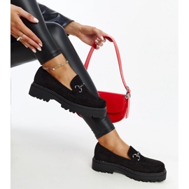 Mustat nahkakengät koristeellisella soljella 1