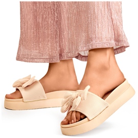 Beiget naisten tossut, joissa rusetti paksussa pohjassa 1