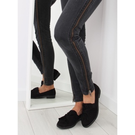 Mustat naisten housut, joissa musta rusetti 2