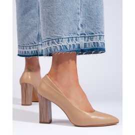 Sergio Leonen beigenväriset naisten pumput, joissa koristeellinen kantapää 1