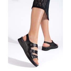 Naisten mustat sandaalit soljilla 1