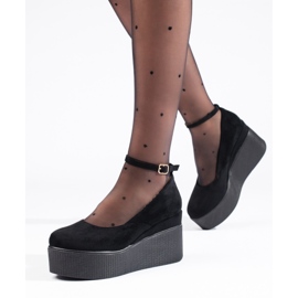 Mustat kiilapumput 1