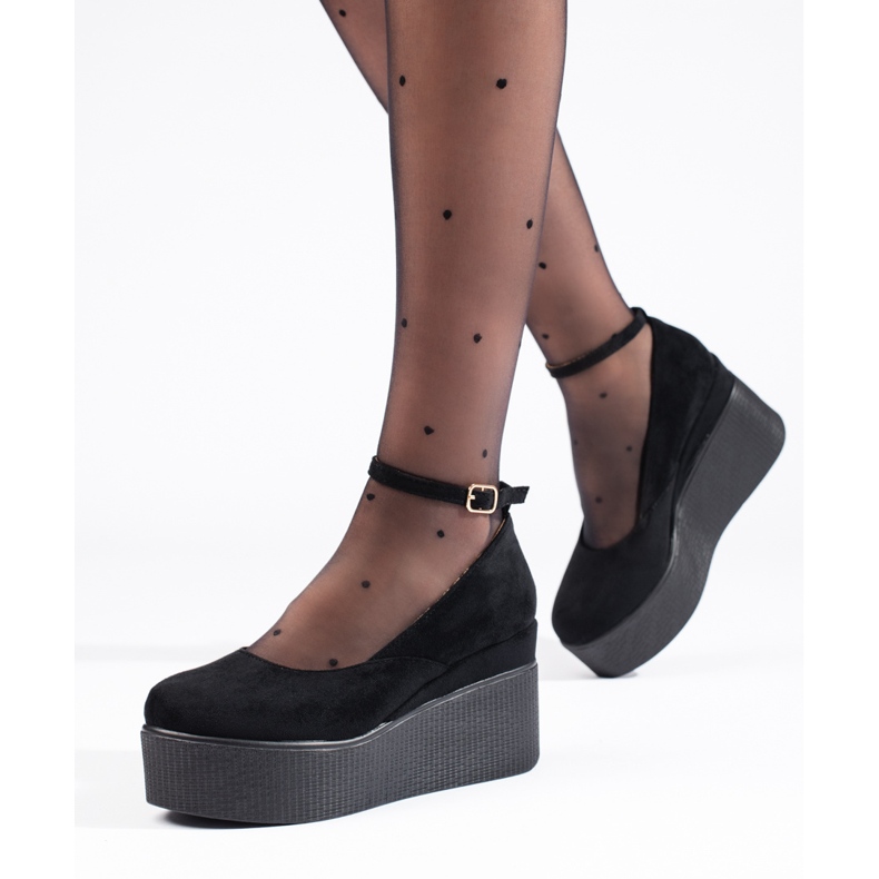 Mustat kiilapumput 1