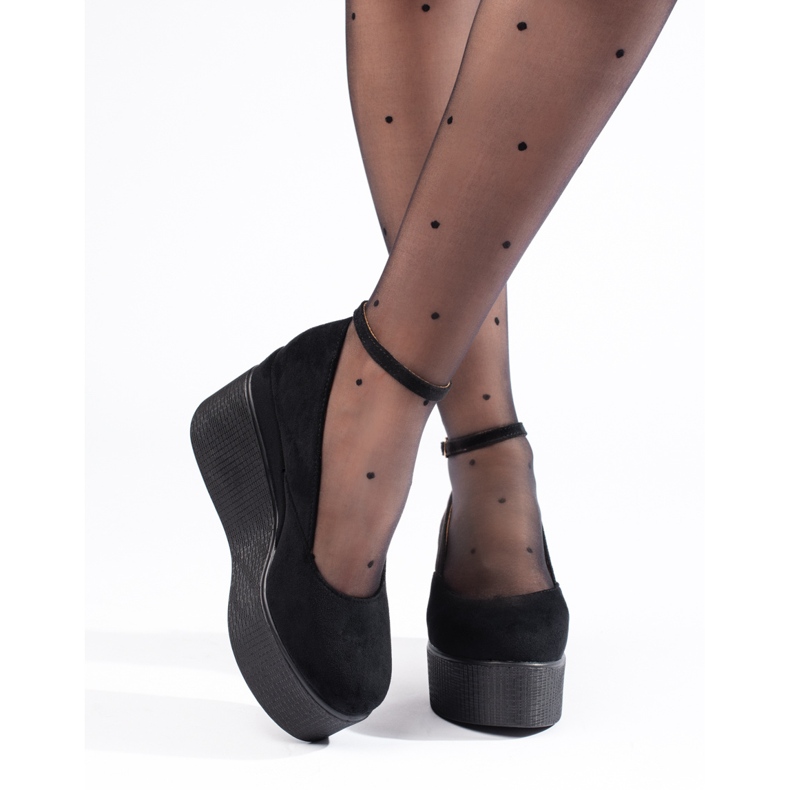 Mustat kiilapumput 2