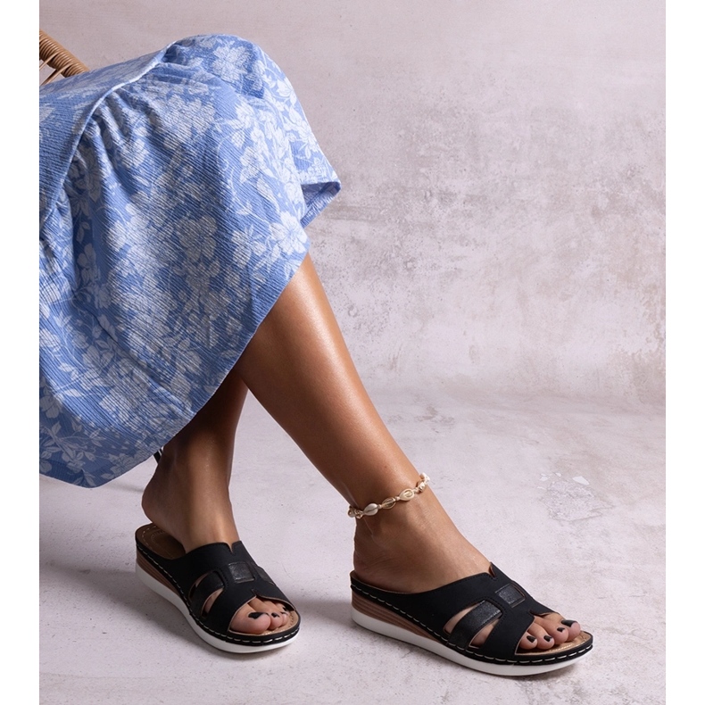 Mustat kevyet Mifsudan tossut matalalla kiilalla 1