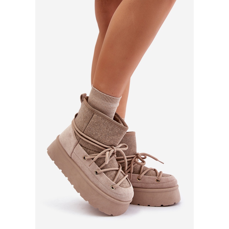 Beiget Mavora lumisaappaat, joissa nauhat alustalla 1