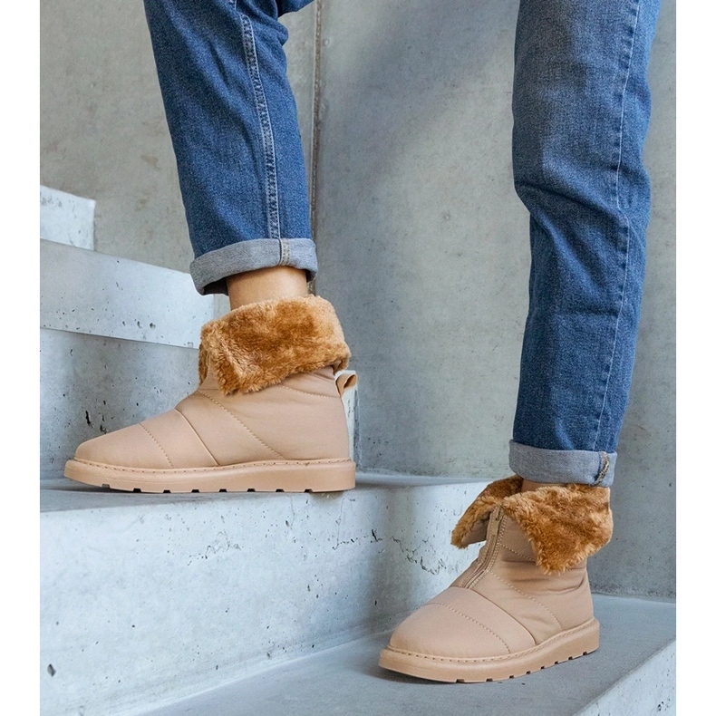 Ediddan beige-eristetyt lumisaappaat kauluksella 1