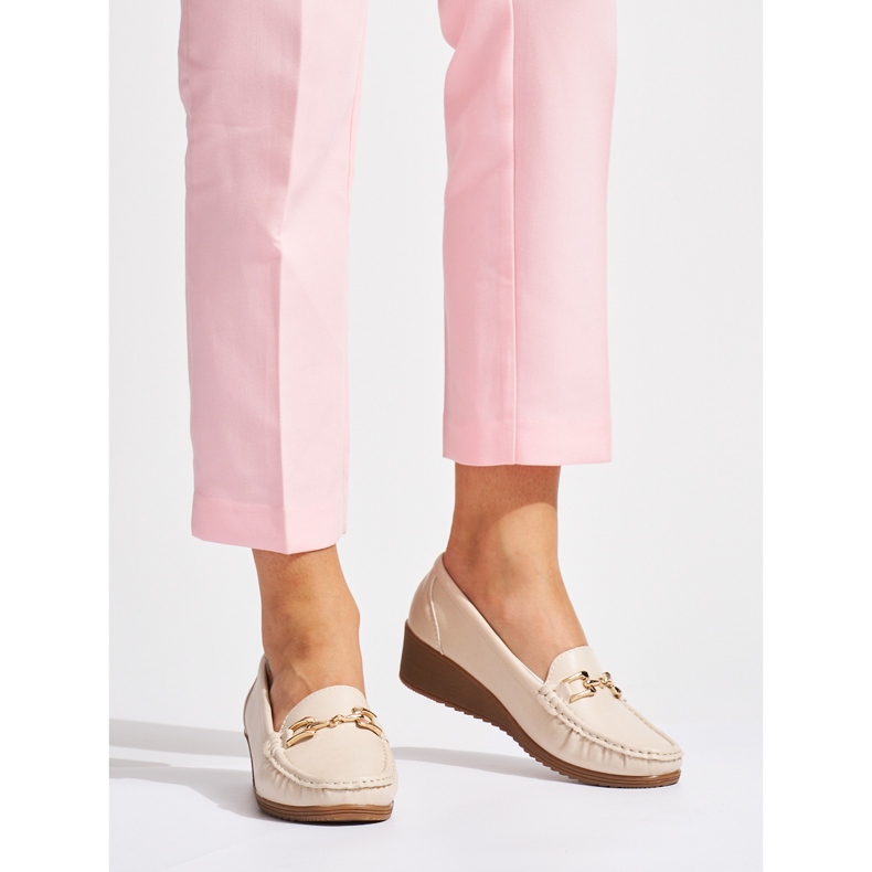 Beiget naisten mokasiinit soljella 1