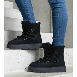 Mustat naisten alustalumisaappaat turkisvuorella 1