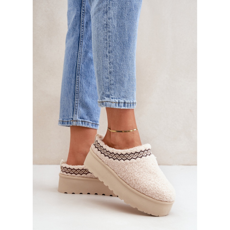 Naisten beige-alustaiset lumisaappaat 1