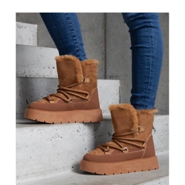 Ruskeat alustalumisaappaat turkiseristyksellä 1