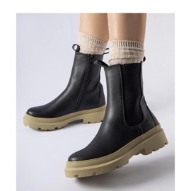 Mustat nilkkurit, joissa oliivipohjainen 1