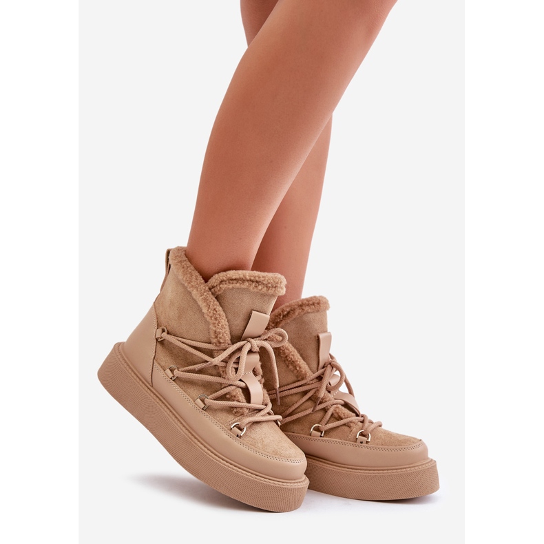 Tummanbeiget Tamidran lumisaappaat alustalla 2