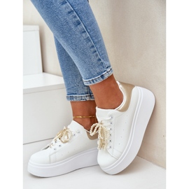 Naisten lenkkarit laiturilla valkoisilla ja kultaisilla koristeilla valkoinen 2