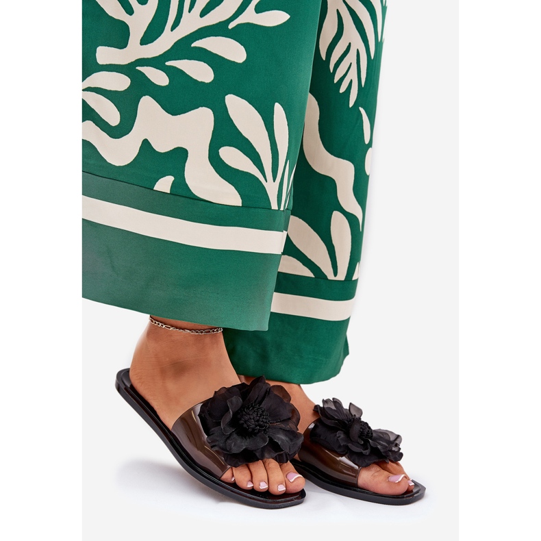 Läpinäkyvät litteät naisten flip flops keinotekoisella kukka mustalla 1