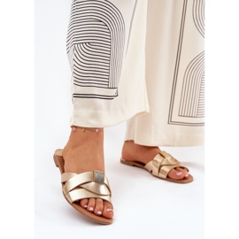 Litteät naisten flopsit toisiinsa kietoutuvilla kultaisilla raidoilla kultainen 2