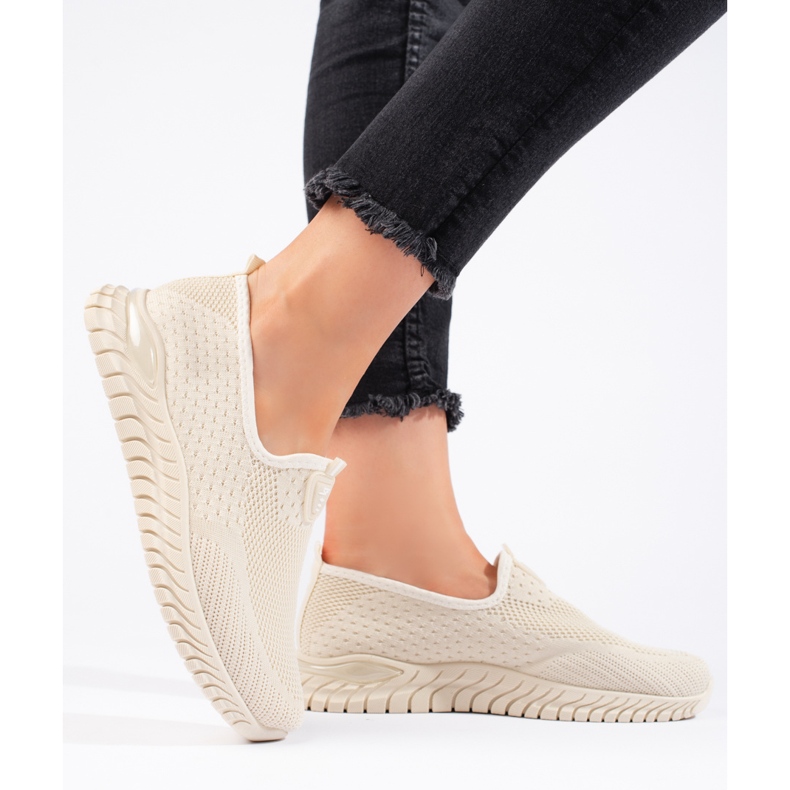 Naisten beigenväriset tekstiililenkkarit 2