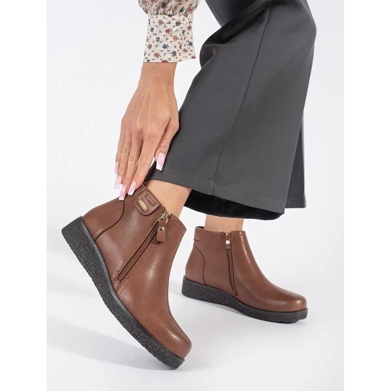 Ruskeat nahkaiset mukavat eristävät saappaat Sergio Leonelta 1