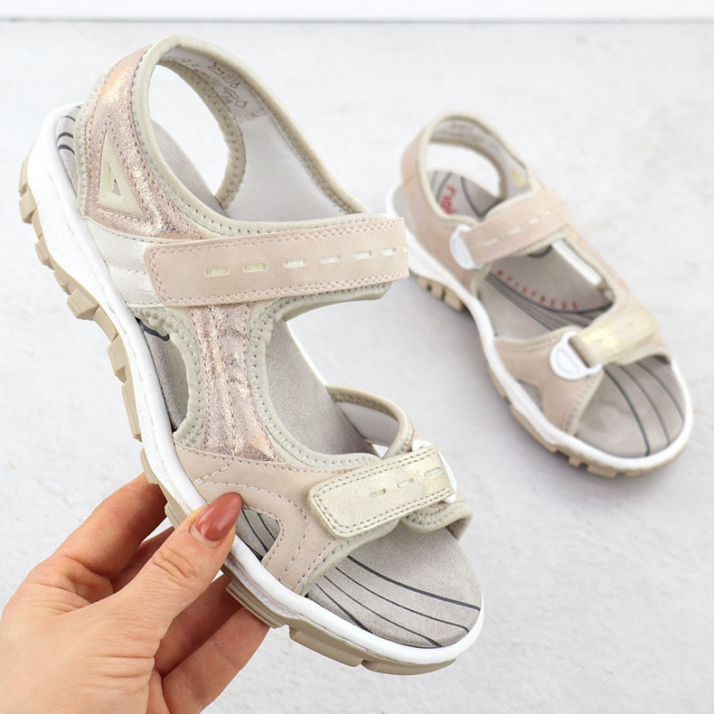 Naisten urheilusandaalit, joissa on vaaleanpunainen jauhe Rieker 68866-31 1