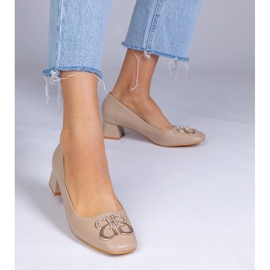 Ruskeat matalan pumpun pumput zirkonilla 1