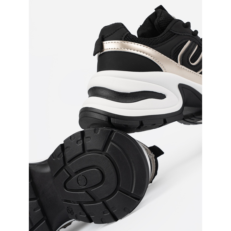 Mustat naisten lenkkarit kultaisilla lisäosilla 1