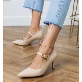 Beige klassiset pumput koristeellisella solkilla 2