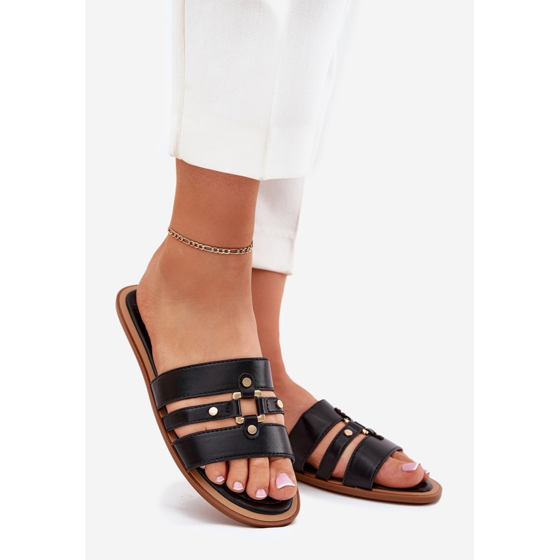 Litteät naisten flip flops kultaisella yksityiskohtaisella mustalla 1