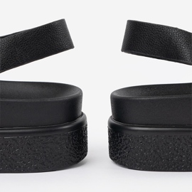 Goodin Musta tyylikkäät sandaalit laiturilla 1