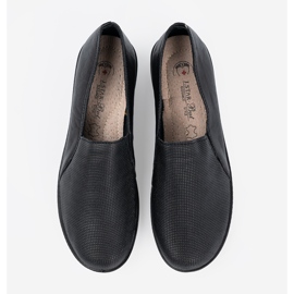 Shelvt Naisten mustat kengät laiturilla 1