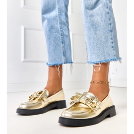 Kultaiset leipät keula- ja teriwa -nallekarhulla kultainen 1