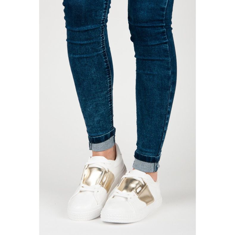 Valkoiset urheilulliset lenkkarit valkoinen keltainen 1