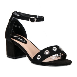 Nio Nio Postissa mustat sandaalit 1