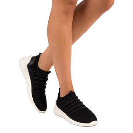 Kylie Slip-On tekstiiliurheilukengät musta 1