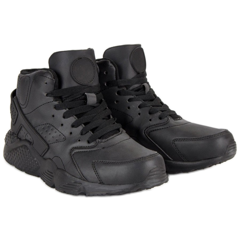 Mustat saappaat nilkan yläpuolella 1