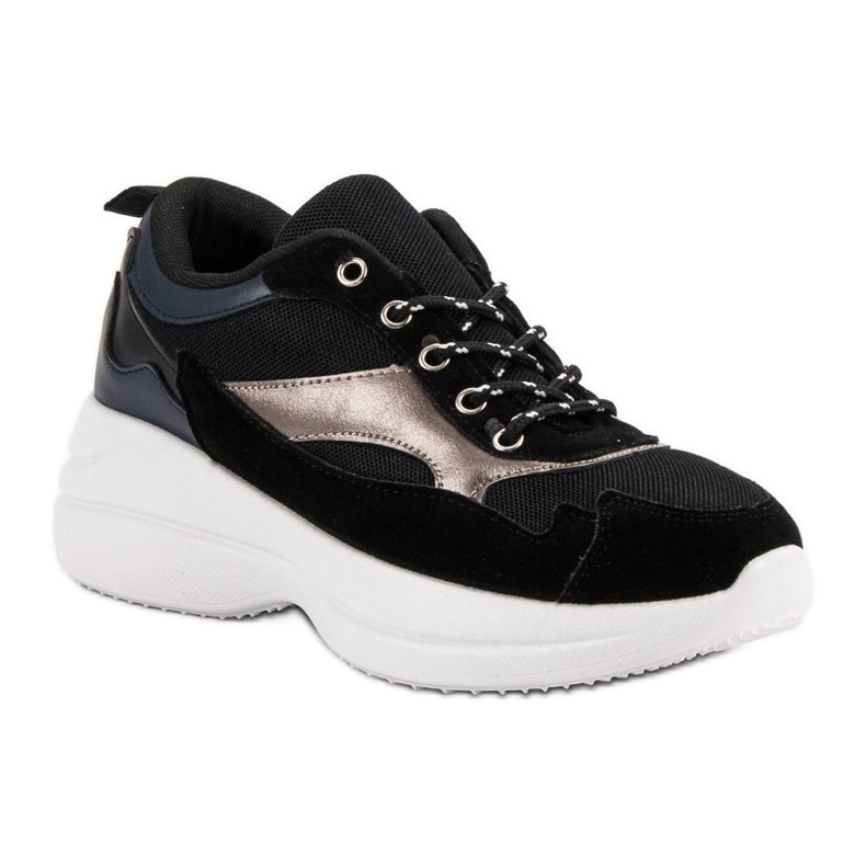 Muodikkaat jalkineet lavalla musta 1