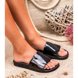 Small Swan Muodikkaat mustat tossut 1