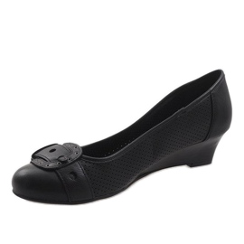 Mustat pumput kiilassa TR22-4 1