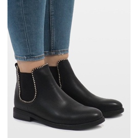 Mustat eristetyt saappaat, joissa kuminauha 1003-PA 1