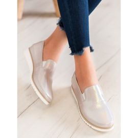 Sergio Leone Kultaiset lippalakit ruskea keltainen 1